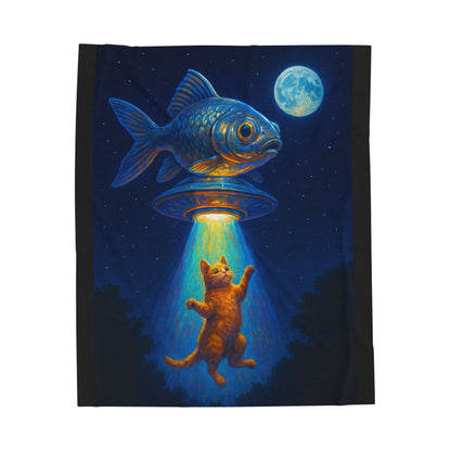 Fleece blanket with a design of a cat looking at a fish in a UFO under a moonlit sky.